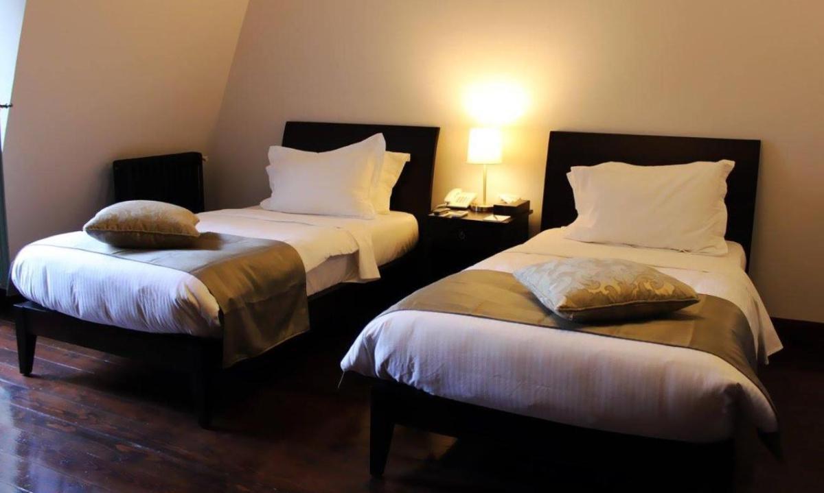 Twin room in a Boutique Hotel – Mina